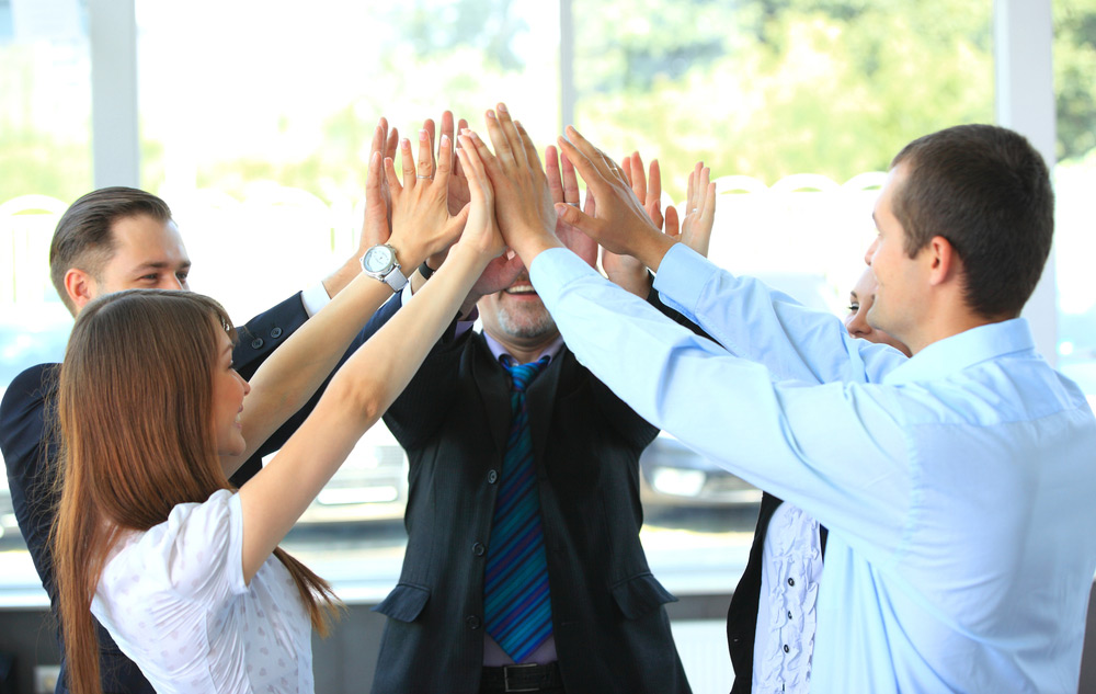 Example of staff working together with current positions