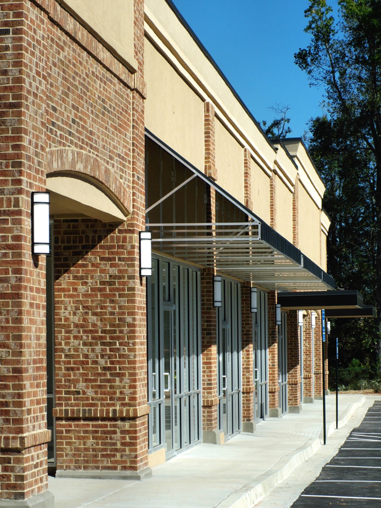 Example of building meeting requirements after ETC transition and warranty surveys